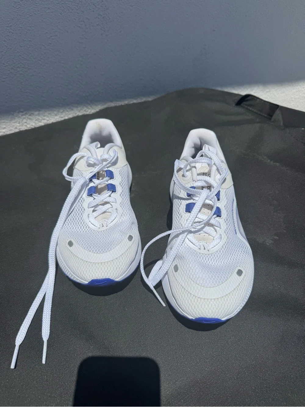 Nike White Running Sneakers with Blue Swoosh Accents